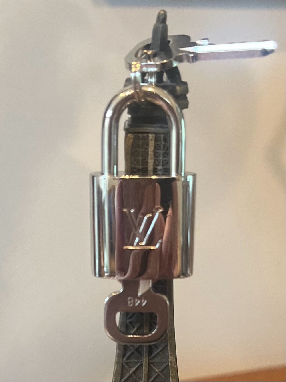 Louis Vuitton Authentic Polished Silver Padlock and Matching Key